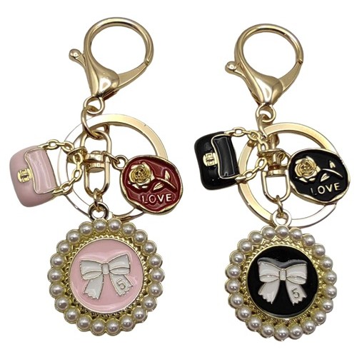 Брелок металевий з підвіскою "Бантик у перлинах" 9см